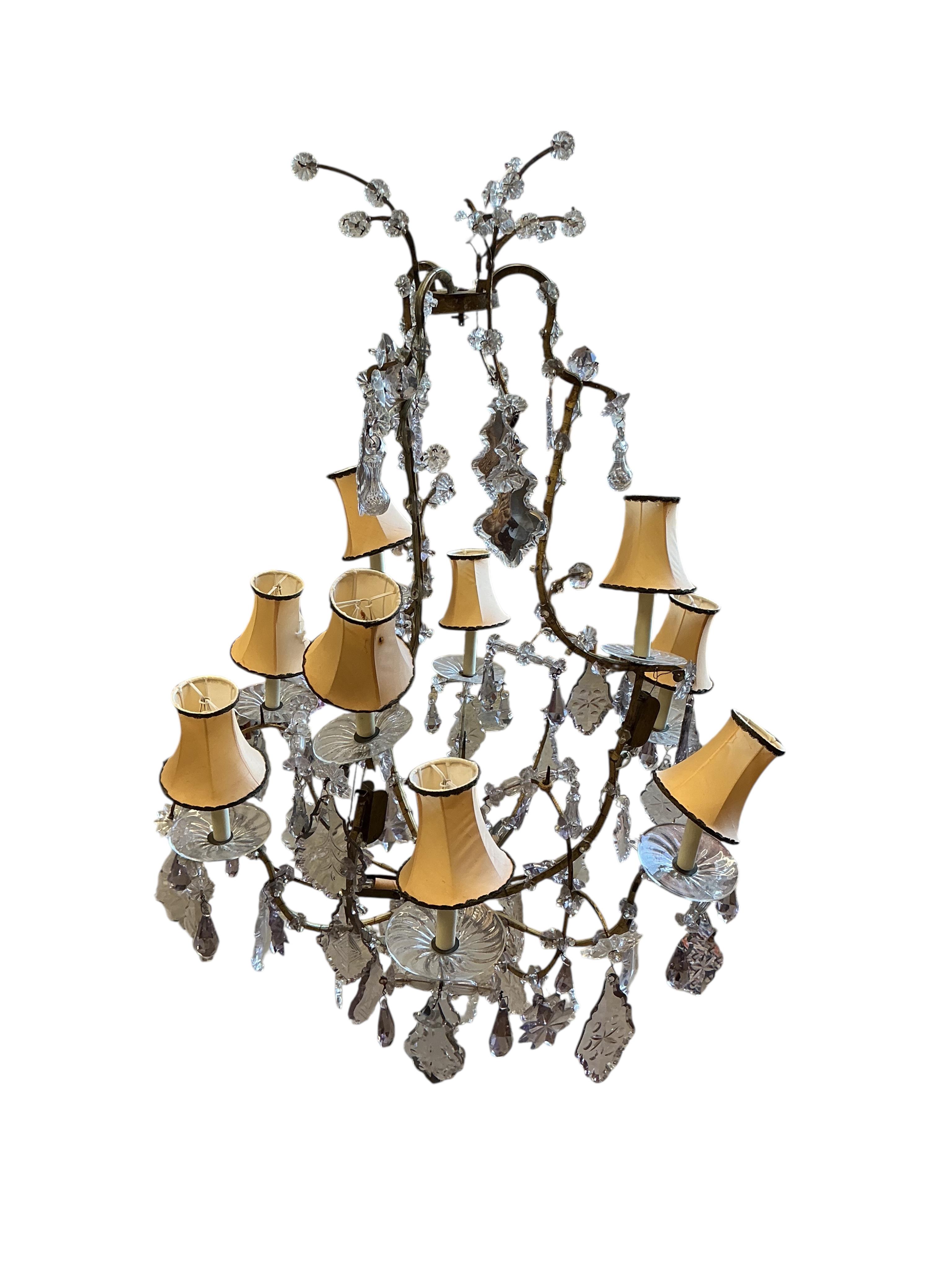 A 19th century French gilt metal and cut glass 12 branch chandelier, converted to electricity, height 108cm